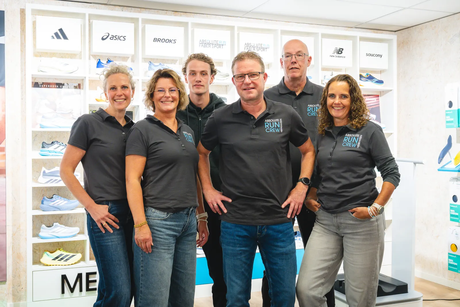 Het team van Absolute Run Faber Sport in de winkel aan de Dracht in Heerenveen
